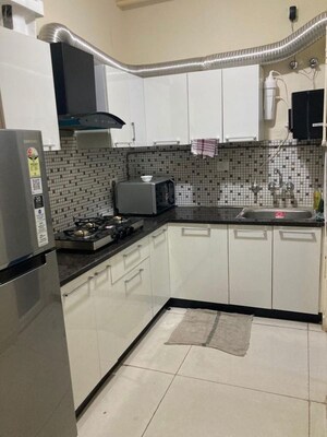 Kitchen in 2 BHK Apartment at Saya Gold Avenue, Vaibhav Khand – for Rent