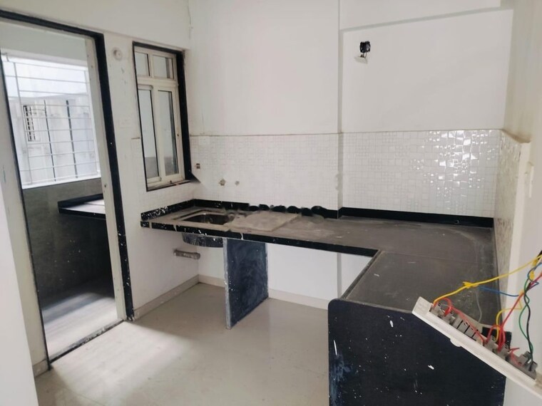 Kitchen, basil-mondale 2 Bedroom 750 Sq.Ft. Apartment In Mundhwa Pune 10182432