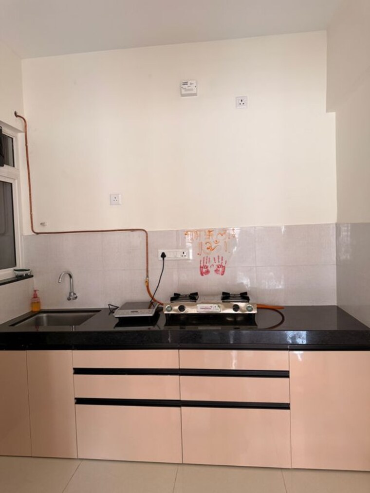 Kitchen, kolte-patil-life-republic-r-10 2 Bedroom 700 Sq.Ft. Builder Floor In Hinjewadi Pune 10182385