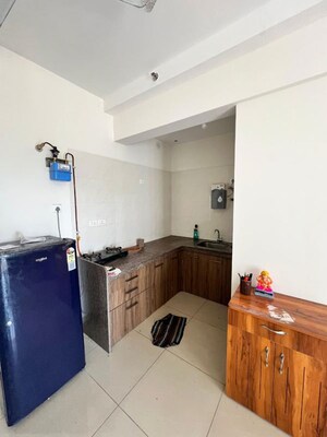 Kitchen in 1 BHK Apartment at Duville Riverdale Suites, Kharadi – for Rent