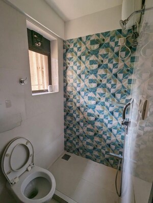 Bathroom in 3 BHK Apartment at Gold Mist, Vile Parle West – for Rent
