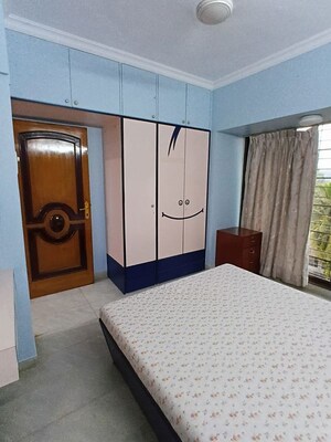 Bedroom in 3 BHK Apartment at Lokhandwala Whispering Palms, Kandivali East – for Rent