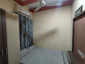 Bedroom in 2 BHK Apartment at Golden Isle, Goregaon East – for Rent