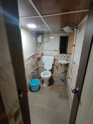 Master Bedroom in 2 BHK Apartment at Golden Isle, Goregaon East – for Rent