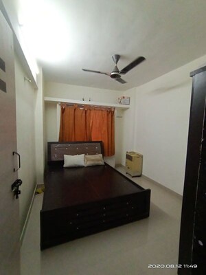 Bedroom in 1 BHK Apartment at Belvalkar Kalpak CHS, Dahanukar Colony – for Rent