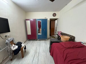 Bedroom in 2 BHK Apartment at Sankalpit CHS, Goregaon East – for Sale