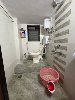 Bathroom in 2 BHK Apartment at Sankalpit CHS, Goregaon East – for Sale