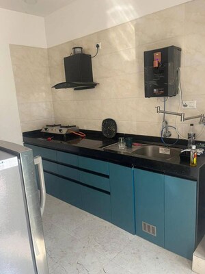 Kitchen in 2 BHK Apartment at Rama Metro Life Maxima Residences, Tathawade – for Rent