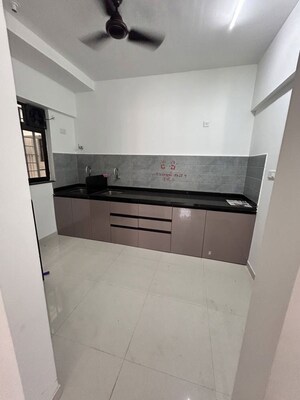 Kitchen in 2 BHK Apartment at Roshan Milestone, Tathawade – for Rent