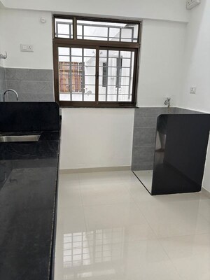 Kitchen in 2 BHK Apartment at Roshan Milestone, Tathawade – for Rent