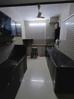 Kitchen in 3 BHK Apartment at Lokhandwala Whispering Palms, Kandivali East – for Rent