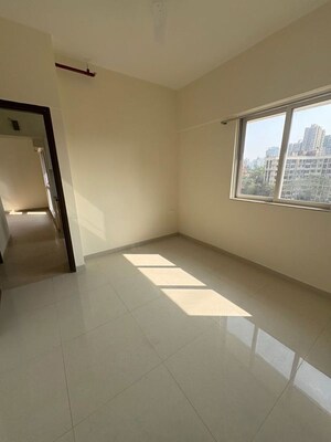 Room in 1 BHK Apartment at Omkar Signet, Malad East – for Sale