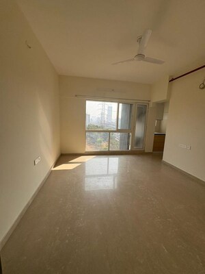 Room in 1 BHK Apartment at Omkar Signet, Malad East – for Sale