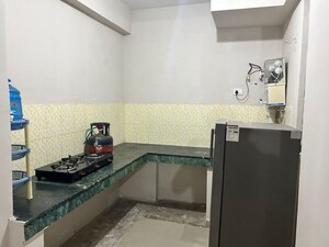 Kitchen in 2 BHK Apartment at Zara Aavaas, Sector 104 – for Sale