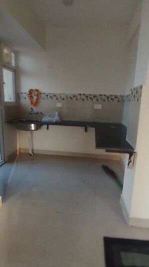 Kitchen in 2 BHK Apartment at Signature Orchard Avenue 2, Sector 93 – for Sale