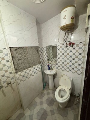 Bathroom in 1 BHK Builder Floor at Dwarka Mor – for Rent