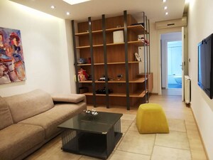 Living Room in 2 BHK Apartment at Highland Park Andheri West, Andheri West – for Rent