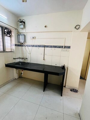 Kitchen in 1 BHK Apartment at Wadgaon Sheri – for Rent