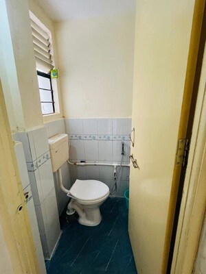 Bathroom in 1 BHK Apartment at Wadgaon Sheri – for Rent