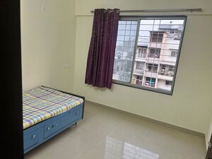 Bedroom in 2 BHK Apartment at Sanskruti Jardin, Baner – for Rent