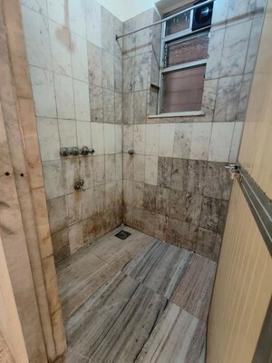 Bathroom in 1 BHK Apartment at Vasant Vihar – for Rent