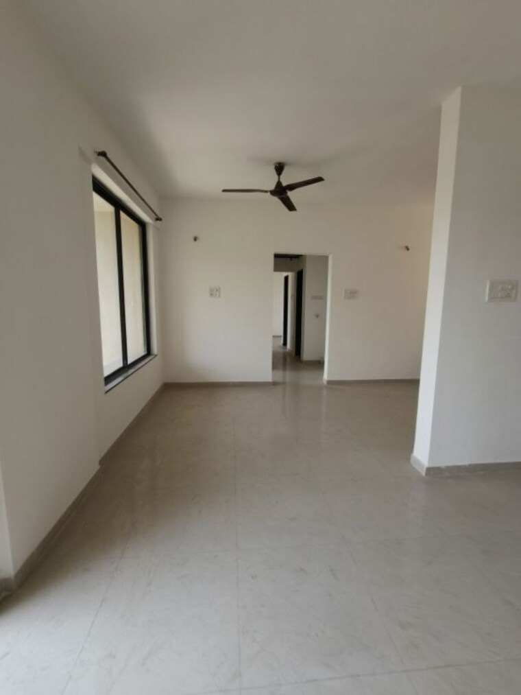Living Room, kolte-patil-margosa-heights 2 Bedroom 1015 Sq.Ft. Apartment In Mohammadwadi Pune 10183107
