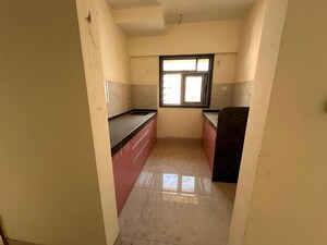 Kitchen in 2 BHK Apartment at Siddhi Highland Park, Kolshet Road – for Sale