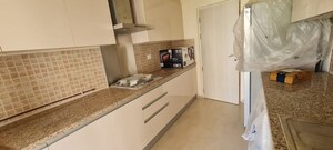 Kitchen in 3 BHK Apartment at DLF The Skycourt, Sector 86 – for Sale