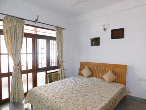 Bedroom in 4 BHK Apartment at RMZ Woodsvale, Benson Town – for Sale