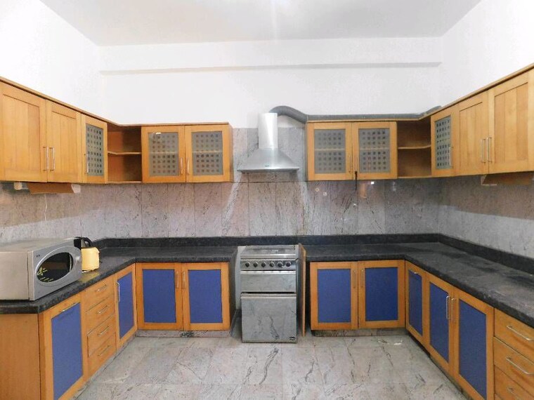 Kitchen, rmz-woodsvale 4 Bedroom 3700 Sq.Ft. Apartment In Benson Town Bangalore 10183177