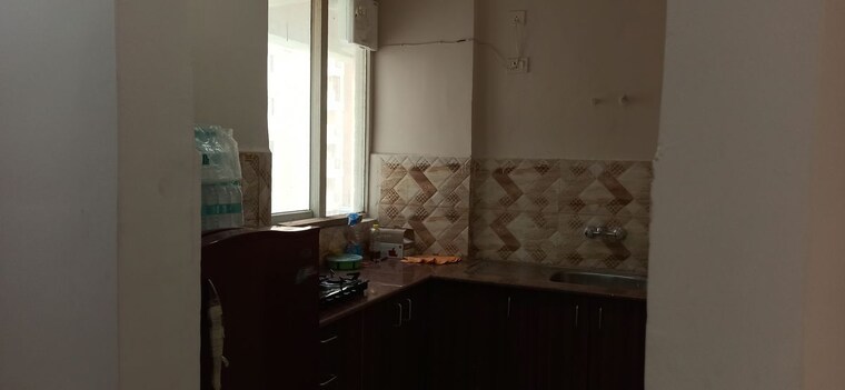 Kitchen, amrapali-golf-homes 3 Bedroom 1115 Sq.Ft. Apartment In Sector 4 Greater Noida Greater Noida 10183182