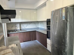 Kitchen in 5 BHK Apartment at DLF Square, Sector 25 – for Sale