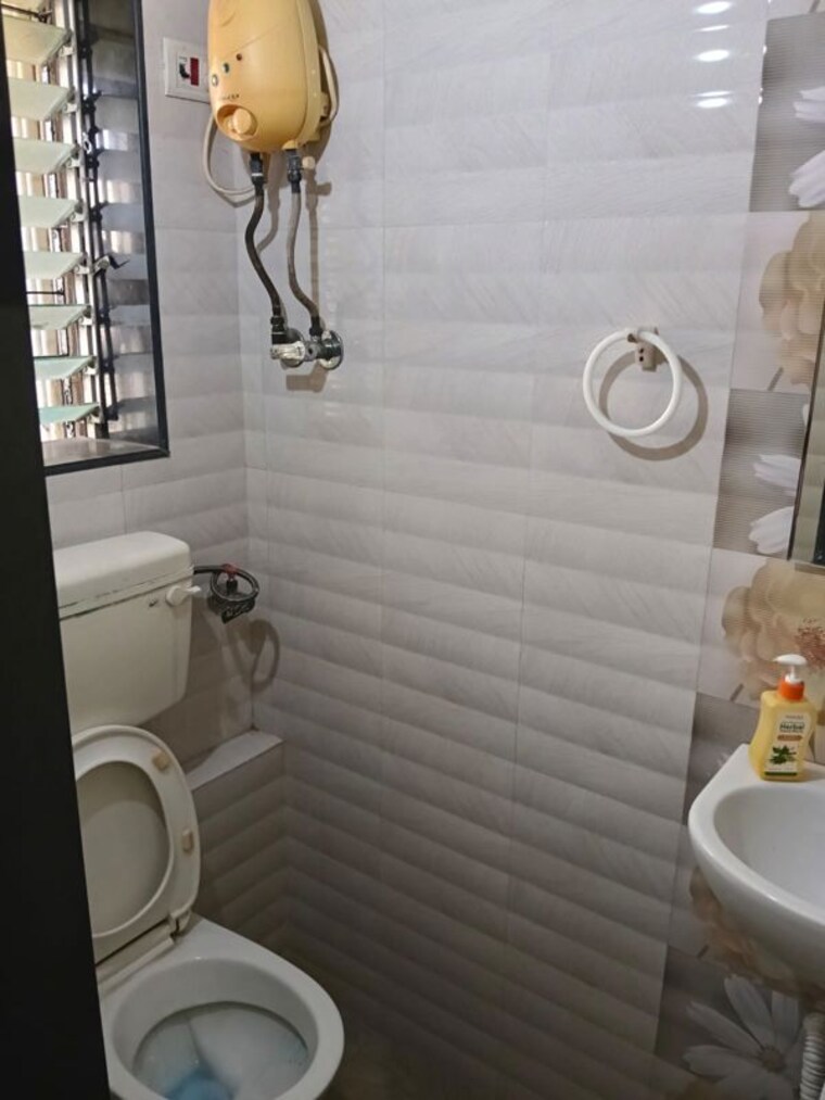 Bathroom, om-siddhi-chs-malad 2 Bedroom 560 Sq.Ft. Apartment In Malad West Mumbai 10183229