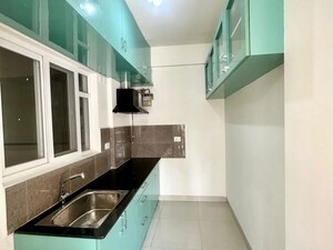 Kitchen in 2 BHK Apartment at Sattva Songbird, Budigere Cross – for Rent