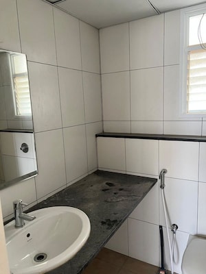 Bathroom in 2 BHK Apartment at Godrej Aqua, International Airport Road – for Rent