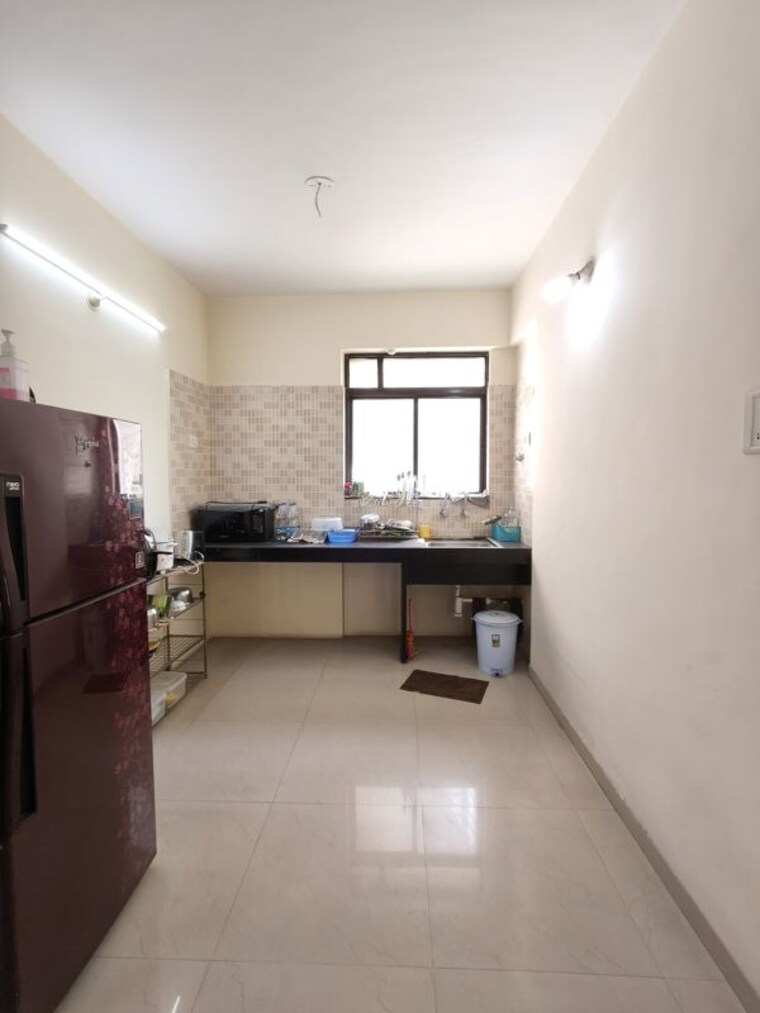 Kitchen, kolte-patil-margosa-heights 2 Bedroom 1015 Sq.Ft. Apartment In Mohammadwadi Pune 10184344