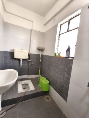 Bathroom in 2 BHK Apartment at Kolte Patil Margosa Heights, Mohammadwadi – for Sale