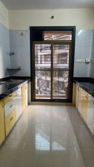 Kitchen in 2 BHK Apartment at Hyde Park CHS, Kharghar – for Rent