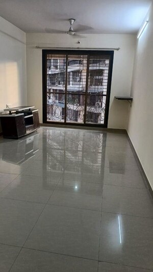 Living Room in 2 BHK Apartment at Hyde Park CHS, Kharghar – for Rent