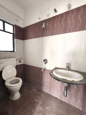 Bathroom in 2 BHK Apartment at Kolte Patil Margosa Heights, Mohammadwadi – for Sale