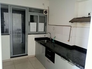 Kitchen in 3 BHK Apartment at Mantra Sky Homes, Magarpatta City – for Sale