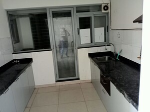 Kitchen in 3 BHK Apartment at Mantra Sky Homes, Magarpatta City – for Sale