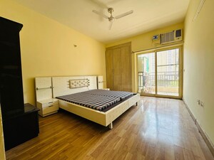 Bedroom in 3.5 BHK Builder Floor at Puri Aman Vilas, Sector 89 – for Rent
