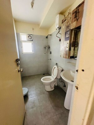 Bathroom in 3.5 BHK Builder Floor at Puri Aman Vilas, Sector 89 – for Rent