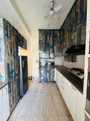 Kitchen in 3.5 BHK Builder Floor at Puri Aman Vilas, Sector 89 – for Rent