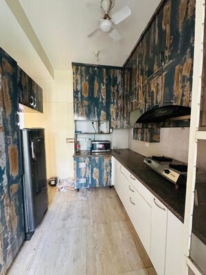 Kitchen in 3.5 BHK Builder Floor at Puri Aman Vilas, Sector 89 – for Rent