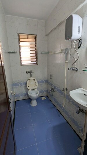 Bathroom in 2 BHK Apartment at Dedhia Palatial Height, Powai – for Rent