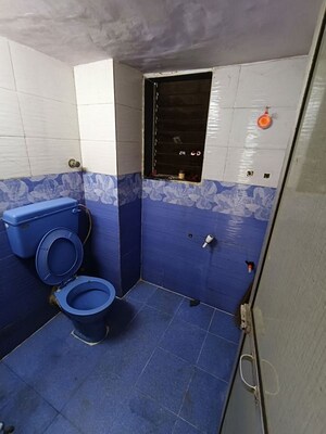Bathroom in 1 BHK Apartment at Ganga Darshan CHS, Versova – for Rent