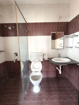 Bathroom in 3 BHK Apartment at Kolte Patil Margosa Heights, Mohammadwadi – for Rent