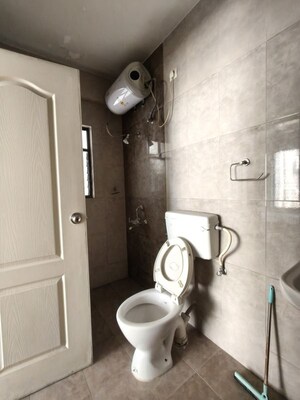 Bathroom in 3 BHK Apartment at Kolte Patil Margosa Heights, Mohammadwadi – for Rent